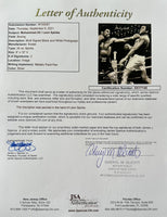 ALI, MUHAMMAD & LEON SPINKS DUAL SIGNED PHOTO (JSA)