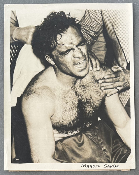 CERDAN, MARCEL ORIGINAL TYPE 1 WIRE PHOTO (1949-AFTER THE LAMOTTA FIGHT)