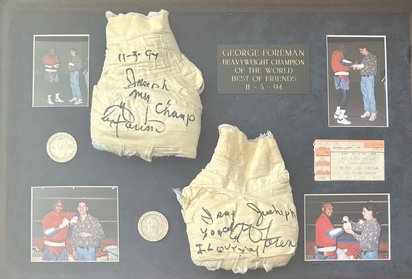 FOREMAN, GEORGE SIGNED TRAINING HAND WRAPS (FOR HIS CHAMPIONSHIP FIGHT WITH MOORER)