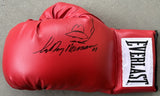 NEIMAN, LEROY SIGNED BOXING GLOVE (WITH SELF PORTRAIT)