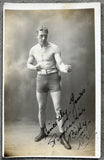 WELLS, BOMBARDIER BILLY SIGNED REAL PHOTO POSTCARD