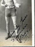 WELLS, BOMBARDIER BILLY SIGNED REAL PHOTO POSTCARD